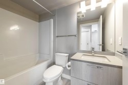 Full bathroom featuring vanity and bathing tub / shower combination - 