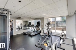 Gym with a paneled ceiling - 