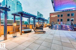 View of patio with a city view and a pergola - 