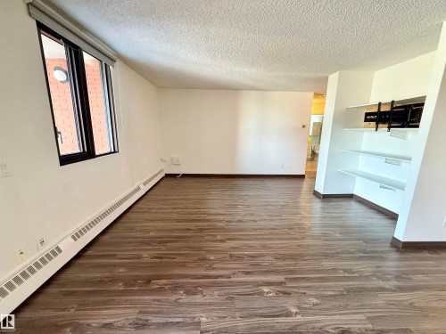 #409 10145 109 St, Edmonton, AB - Indoor Photo Showing Other Room