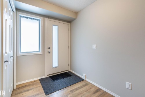 Foyer featuring light wood-style floors - 17259 9A Avenue Sw, Edmonton, AB - Indoor Photo Showing Other Room