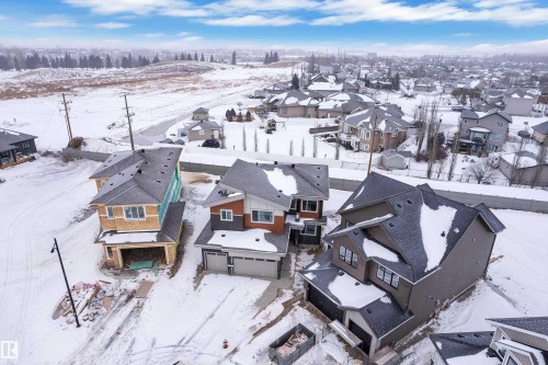 Snowy aerial view with a residential view - 159 Graybriar Dr, Stony Plain, AB - Outdoor With View