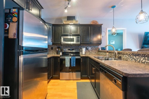 9 671 Silver Berry Road Nw, Edmonton, AB - Indoor Photo Showing Kitchen With Double Sink With Upgraded Kitchen