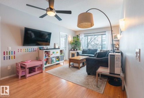 9 671 Silver Berry Road Nw, Edmonton, AB - Indoor Photo Showing Living Room