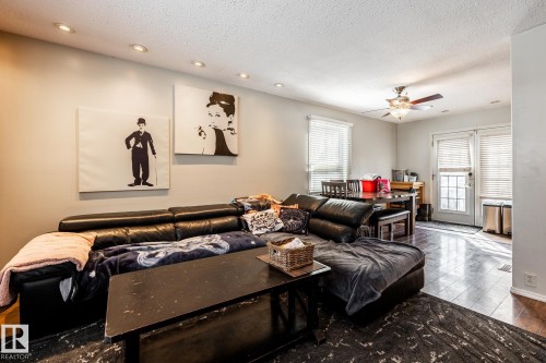 Living room featuring ceiling fan, a textured ceiling, and recessed lighting - 69 Amherst Crescent, St. Albert, AB - Indoor