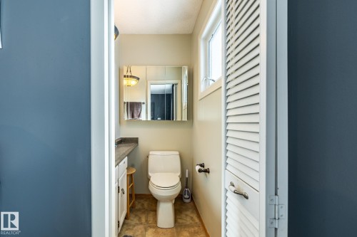 Half bath with a closet and vanity - 69 Amherst Crescent, St. Albert, AB - Indoor Photo Showing Bathroom