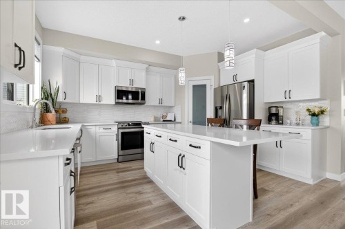 80 Maple Crescent, Gibbons, AB - Indoor Photo Showing Kitchen With Upgraded Kitchen