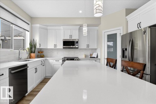 80 Maple Crescent, Gibbons, AB - Indoor Photo Showing Kitchen With Upgraded Kitchen