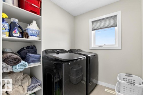 On the 2nd floor - 80 Maple Crescent, Gibbons, AB - Indoor Photo Showing Laundry Room