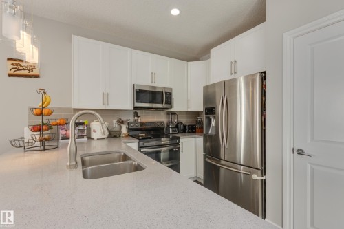 6687 Cardinal Road, Edmonton, AB - Indoor Photo Showing Kitchen With Double Sink