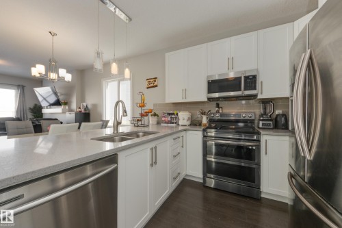 6687 Cardinal Road, Edmonton, AB - Indoor Photo Showing Kitchen With Double Sink