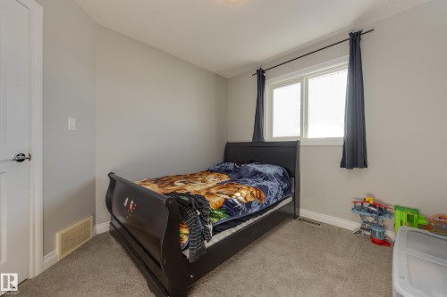 6687 Cardinal Road, Edmonton, AB - Indoor Photo Showing Bedroom