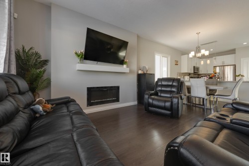 6687 Cardinal Road, Edmonton, AB - Indoor Photo Showing Living Room With Fireplace