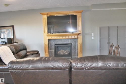 26 Longview Drive, Spruce Grove, AB - Indoor Photo Showing Living Room With Fireplace