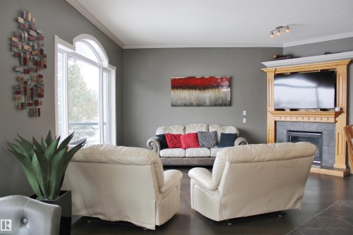 26 Longview Drive, Spruce Grove, AB - Indoor Photo Showing Living Room With Fireplace