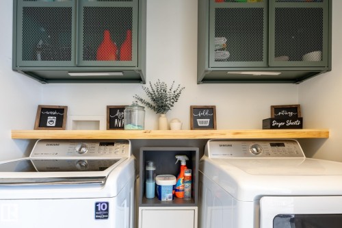 Laundry area with independent washer and dryer - 3312 17B Avenue, Edmonton, AB - Indoor Photo Showing Laundry Room