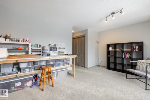 Home office featuring light carpet and a textured ceiling - 3312 17B Avenue, Edmonton, AB - Indoor