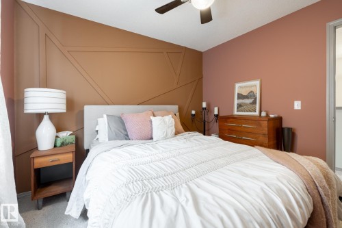 Bedroom with vaulted ceiling, ceiling fan, and carpet flooring - 3312 17B Avenue, Edmonton, AB - Indoor Photo Showing Bedroom