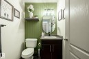 Bathroom featuring toilet and vanity - 3312 17B Avenue, Edmonton, AB  - Indoor Photo Showing Bathroom 