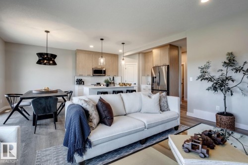 407 Brickyard Point(E), Stony Plain, AB - Indoor Photo Showing Living Room