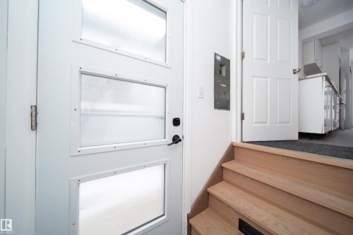 Entryway featuring stairs and electric panel - 11430 81 Street, Edmonton, AB - Indoor Photo Showing Other Room