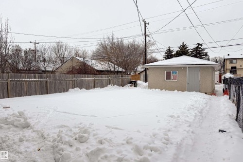 Yard layered in snow with an outbuilding - 11430 81 Street, Edmonton, AB - Outdoor