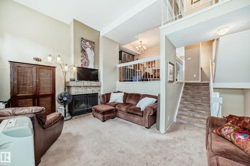 1049 Millbourne Road E, Edmonton, AB - Indoor Photo Showing Living Room With Fireplace