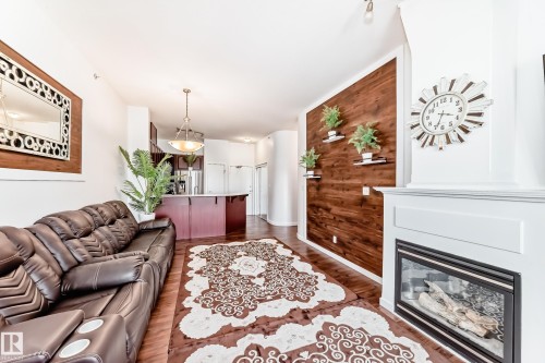 412 4312 139 Avenue, Edmonton, AB - Indoor Photo Showing Living Room With Fireplace