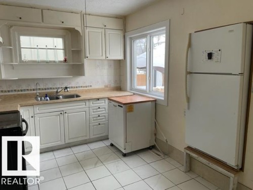 10917 96 Street, Edmonton, AB - Indoor Photo Showing Kitchen With Double Sink