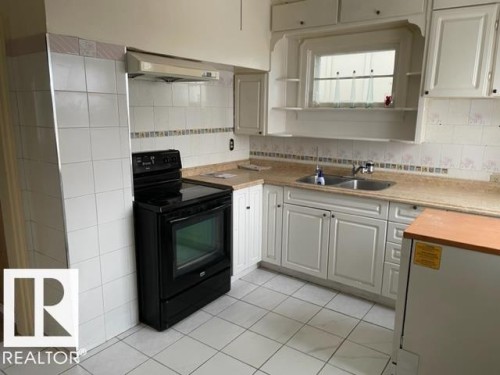 10917 96 Street, Edmonton, AB - Indoor Photo Showing Kitchen With Double Sink