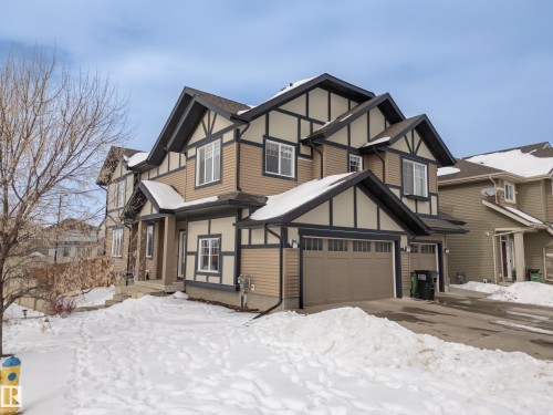 Tudor home with driveway - 2704 Coughlan Green, Edmonton, AB - Outdoor
