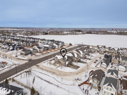 Snowy aerial view with a residential view - 2704 Coughlan Green, Edmonton, AB - Outdoor With View