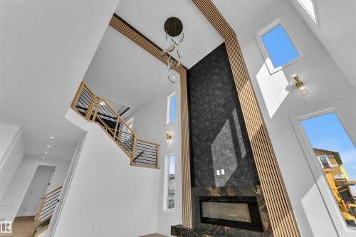 103 28 Street, Edmonton, AB - Indoor Photo Showing Other Room With Fireplace