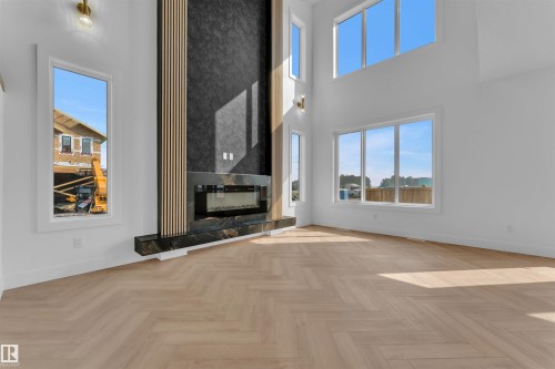 103 28 Street, Edmonton, AB - Indoor Photo Showing Other Room With Fireplace
