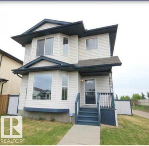 View of front of property with a front yard - 4404 150 Avenue, Edmonton, AB - Outdoor
