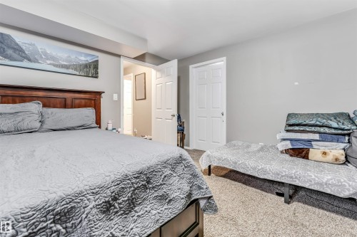 Bedroom with light colored carpet - 4404 150 Avenue, Edmonton, AB - Indoor Photo Showing Bedroom