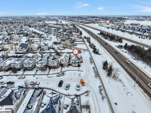 Snowy aerial view featuring a residential view - 4404 150 Avenue, Edmonton, AB - Outdoor With View