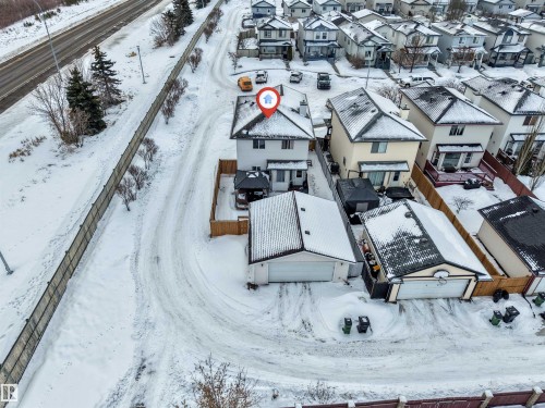 Snowy aerial view featuring a residential view - 4404 150 Avenue, Edmonton, AB - Outdoor