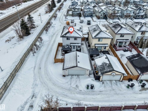 Snowy aerial view featuring a residential view - 4404 150 Avenue, Edmonton, AB - Outdoor