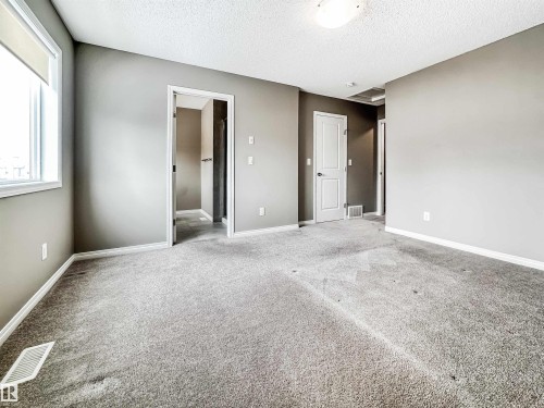 100 2072 Wonnacott Way, Edmonton, AB - Indoor Photo Showing Other Room