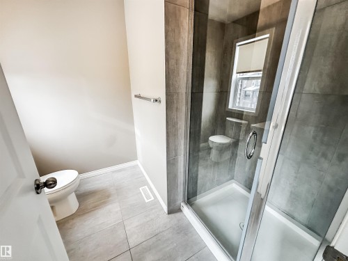 100 2072 Wonnacott Way, Edmonton, AB - Indoor Photo Showing Bathroom