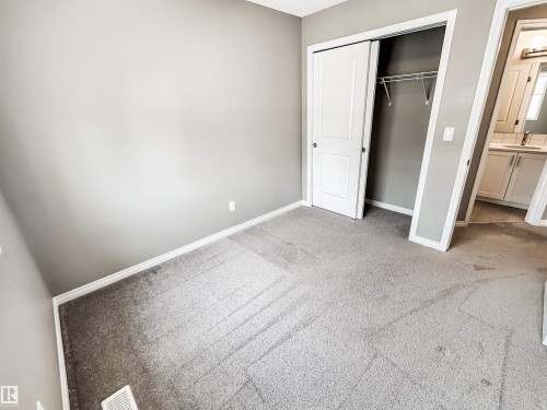 100 2072 Wonnacott Way, Edmonton, AB - Indoor Photo Showing Other Room