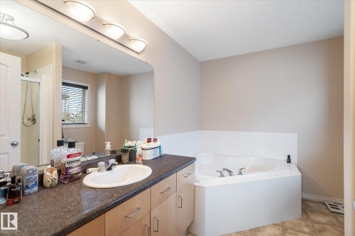 Bathroom with vanity, a shower stall, and a garden tub - 66 Nadine Way, St. Albert, AB - Indoor Photo Showing Bathroom