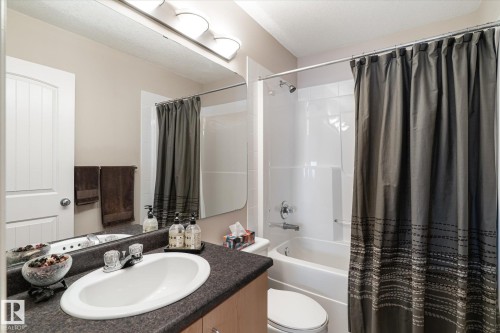 Bathroom with vanity and shower / bath combo - 66 Nadine Way, St. Albert, AB - Indoor Photo Showing Bathroom