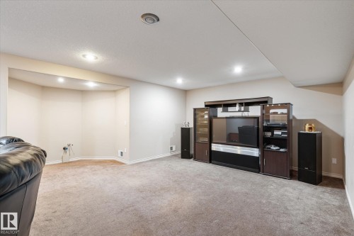 Living area with light carpet and recessed lighting - 66 Nadine Way, St. Albert, AB - Indoor