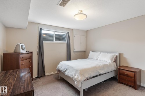 Bedroom with light colored carpet and baseboards - 66 Nadine Way, St. Albert, AB - Indoor Photo Showing Bedroom