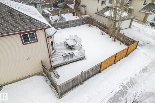 Snowy aerial view featuring a residential view - 66 Nadine Way, St. Albert, AB - Outdoor With Exterior
