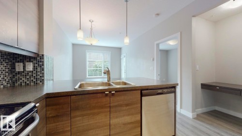 109 2590 Anderson Way Sw, Edmonton, AB - Indoor Photo Showing Kitchen With Double Sink