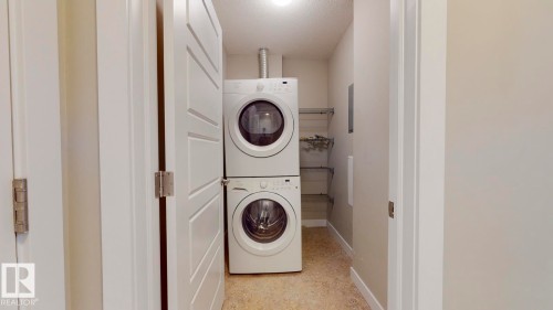 109 2590 Anderson Way Sw, Edmonton, AB - Indoor Photo Showing Laundry Room