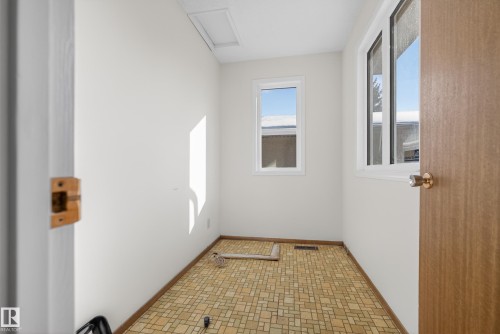 Empty room featuring baseboards - 11435 37A Avenue, Edmonton, AB - Indoor Photo Showing Other Room